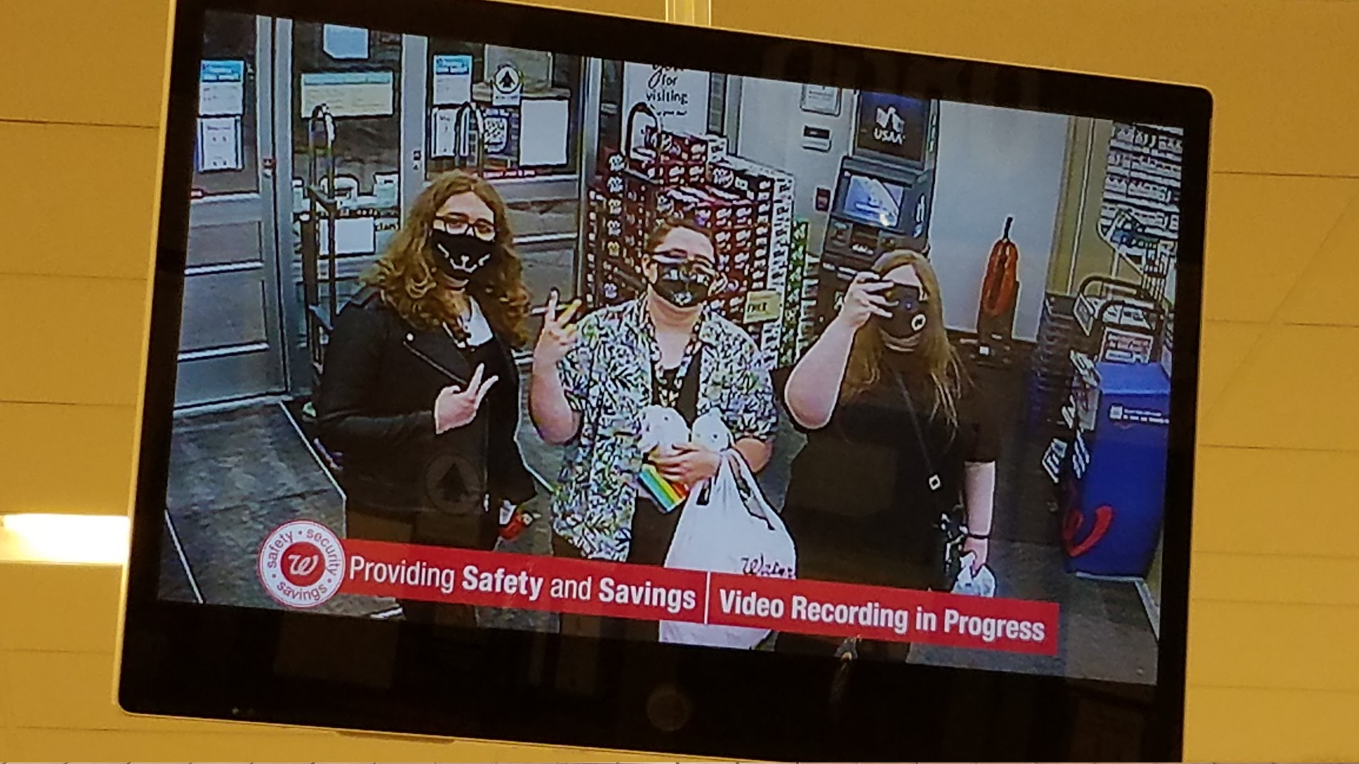 three cuties inside of a walgreens